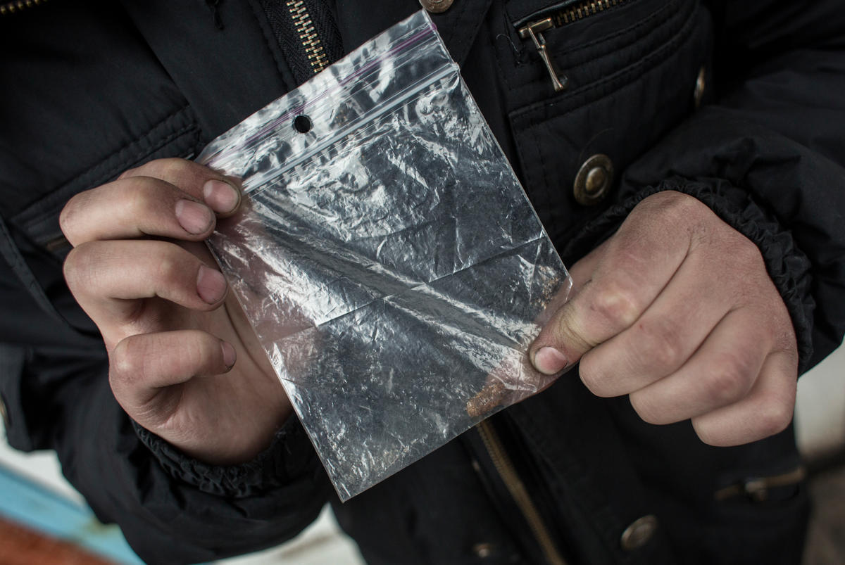 Ukraine. Freedom of movement. Yulia and her son Misha live in a restricted area of Mariinka to where access is very limited.