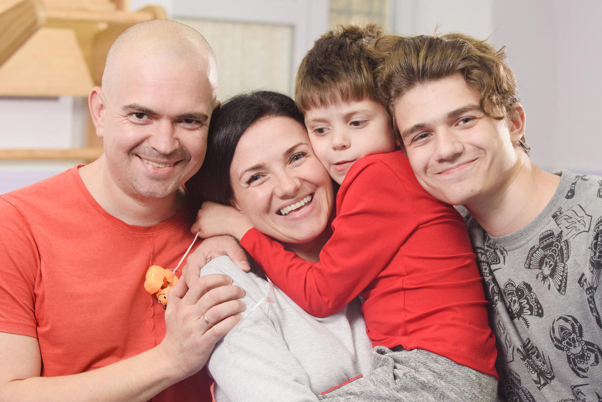 Olena Abayeva and her family in the centre for children with mental disorders opened by Olena (IDP) in Sumy with support from UNHCR
