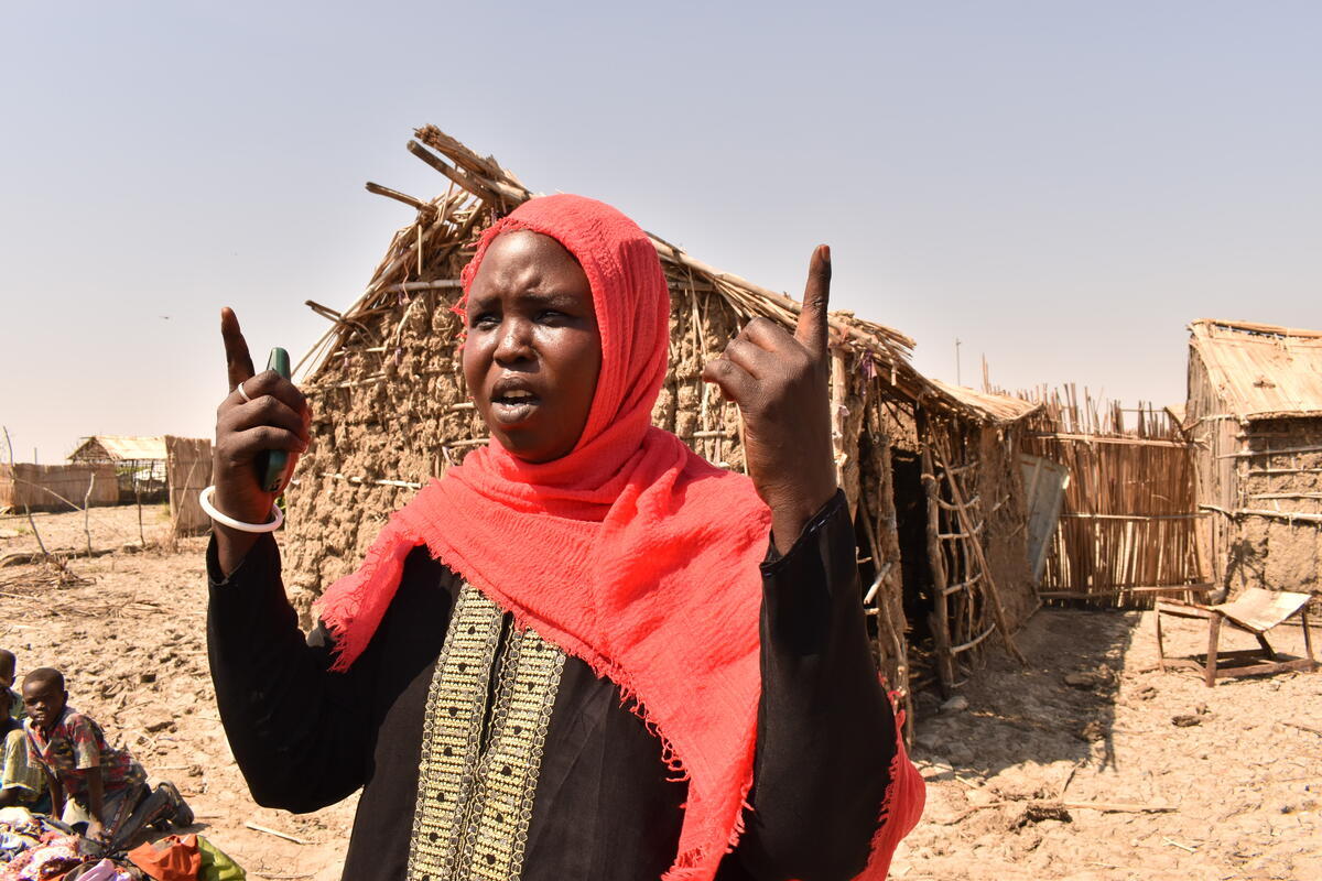 Sudan. Nyalan recalls the night the White Nile River burst its banks and water rushed into her shelter.