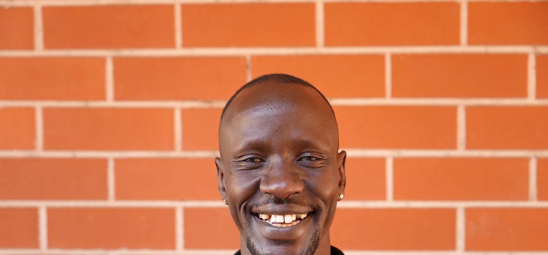 Deng smiles