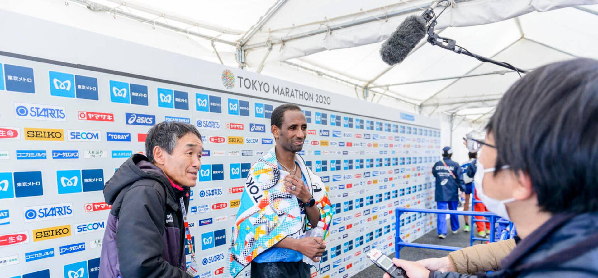 Refugee athlete Yonas Kinde is interviewed after finishing the Tokyo Marathon 2020.