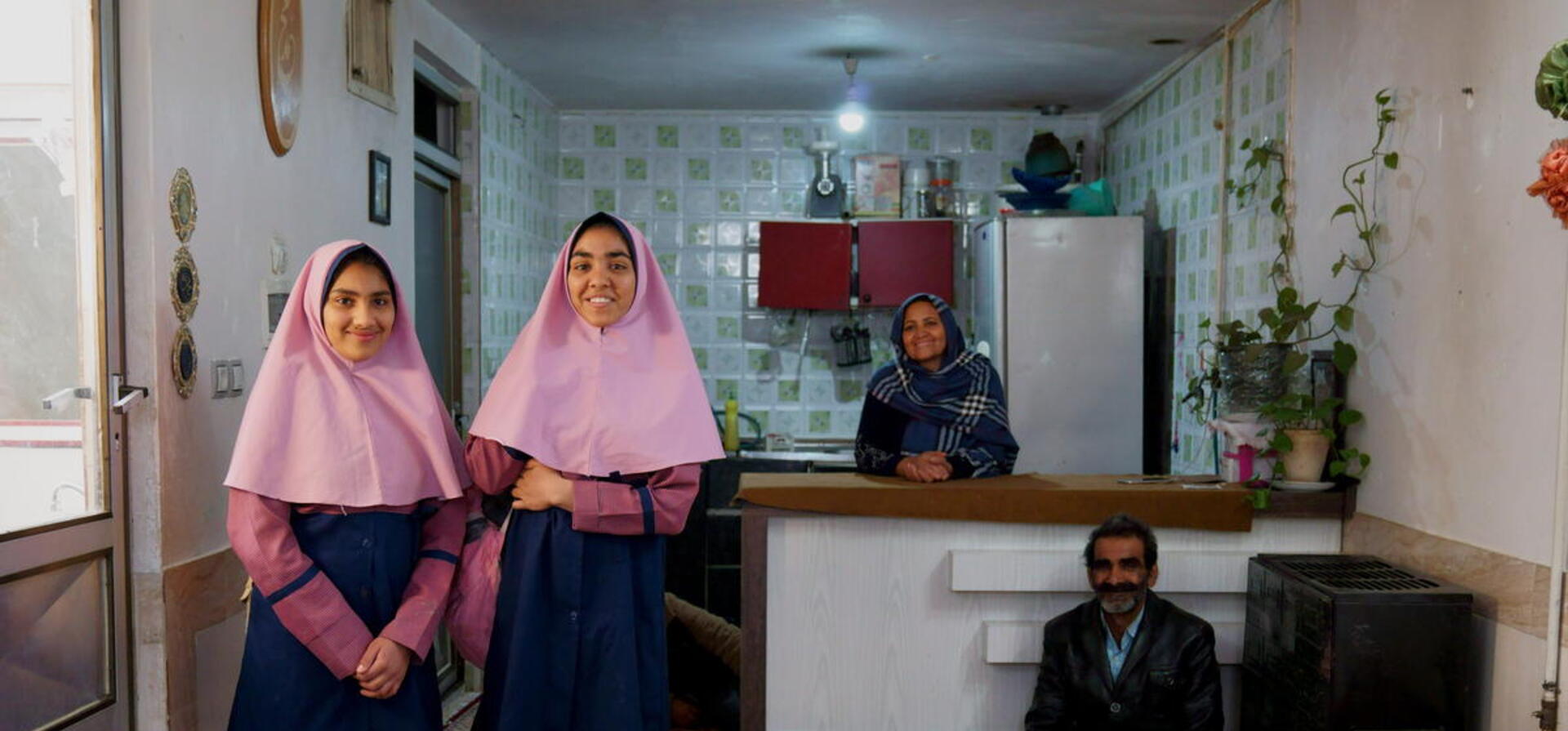 Iran. Afghan refugee sisters in Isfahan go to school for the first time