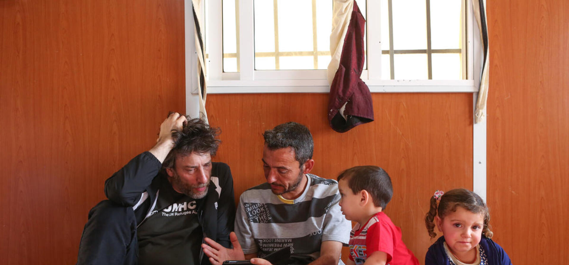 Jordan. UNHCR Goodwill Ambassador Neil Gaiman visits refugees at Zaatari camp, Jordan.