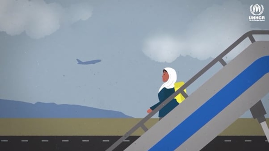 A woman getting off a plane