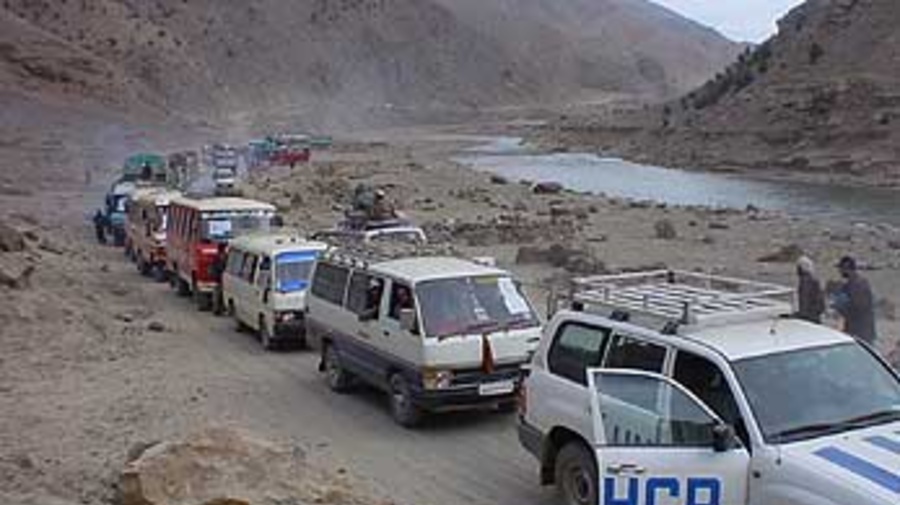 Afghans returning to the Shomali Plain east of Kabul after three years of internal exile.
