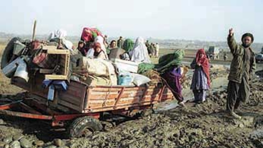 Afghan refugees returning home from Pakistan late last year.