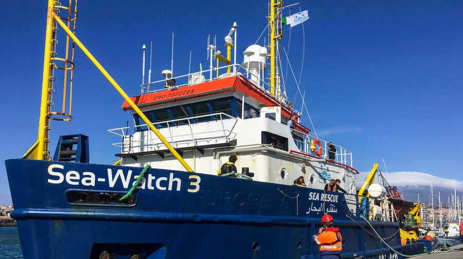 Italy. Rescued refugees and migrants disembark after marathon ordeal