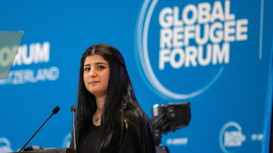 Switzerland. Former Iraqi refugee speaks at the Global Refugee Forum