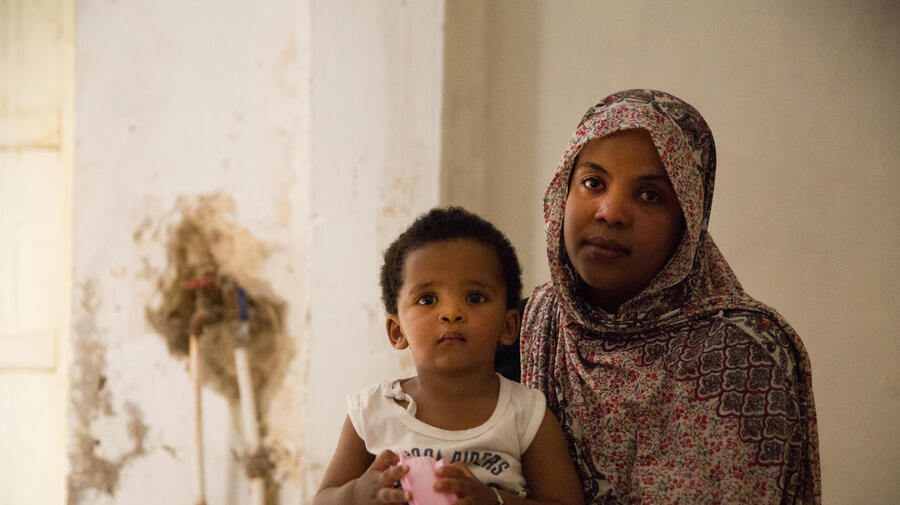 Libya. Sudanese caregiver hosts fellow refugees through UNHCR programme