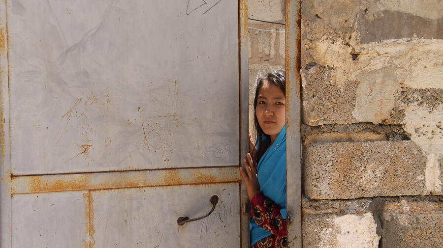 Iran. Refugee girl in Sarvestan Settlement in Shiraz
