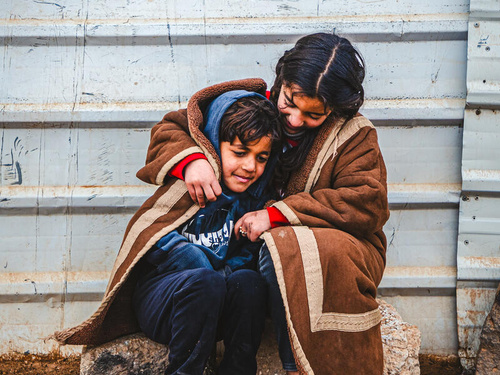 Jordan. Smiling Through the Harsh Winter in Zaatari camp.