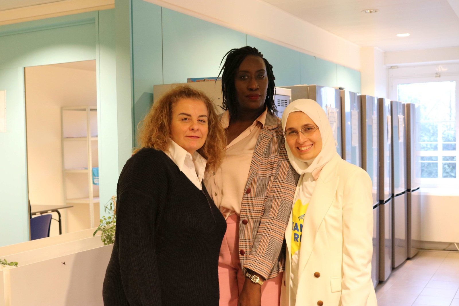 Santa, Doris and Mouna now manage the Triomphe shelter, offering asylum-seekers a safe place to sleep and services to integrate in their new community. 