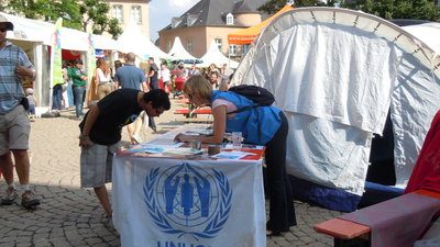 UNHCR toont dagelijkse realiteit van vluchtelingen aan MeYouZik festival-gangers