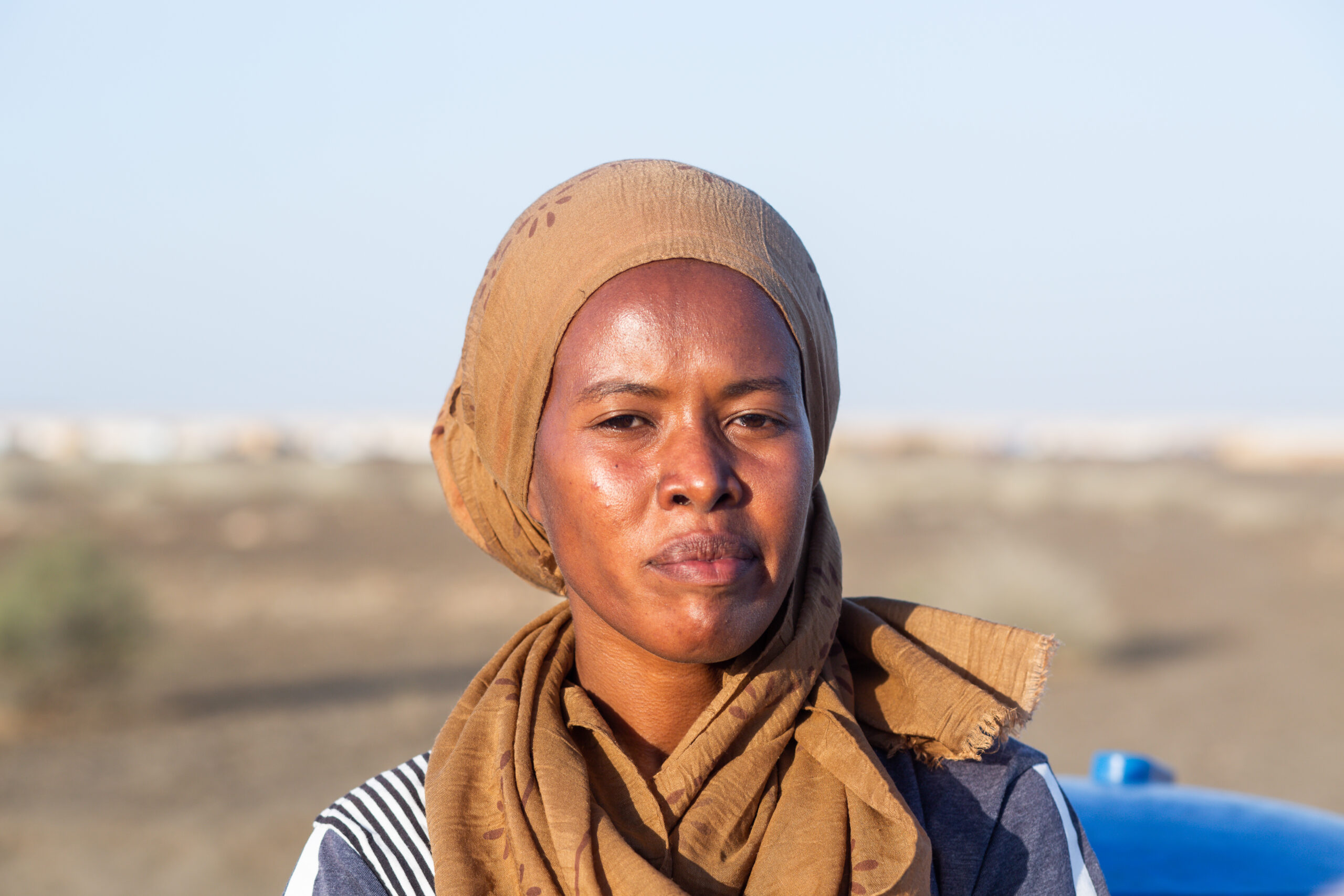 Mihret (25) in het Tunaydbah -vluchtelingenkamp in Soedan. © UNHCR/Ahmed Kwarte