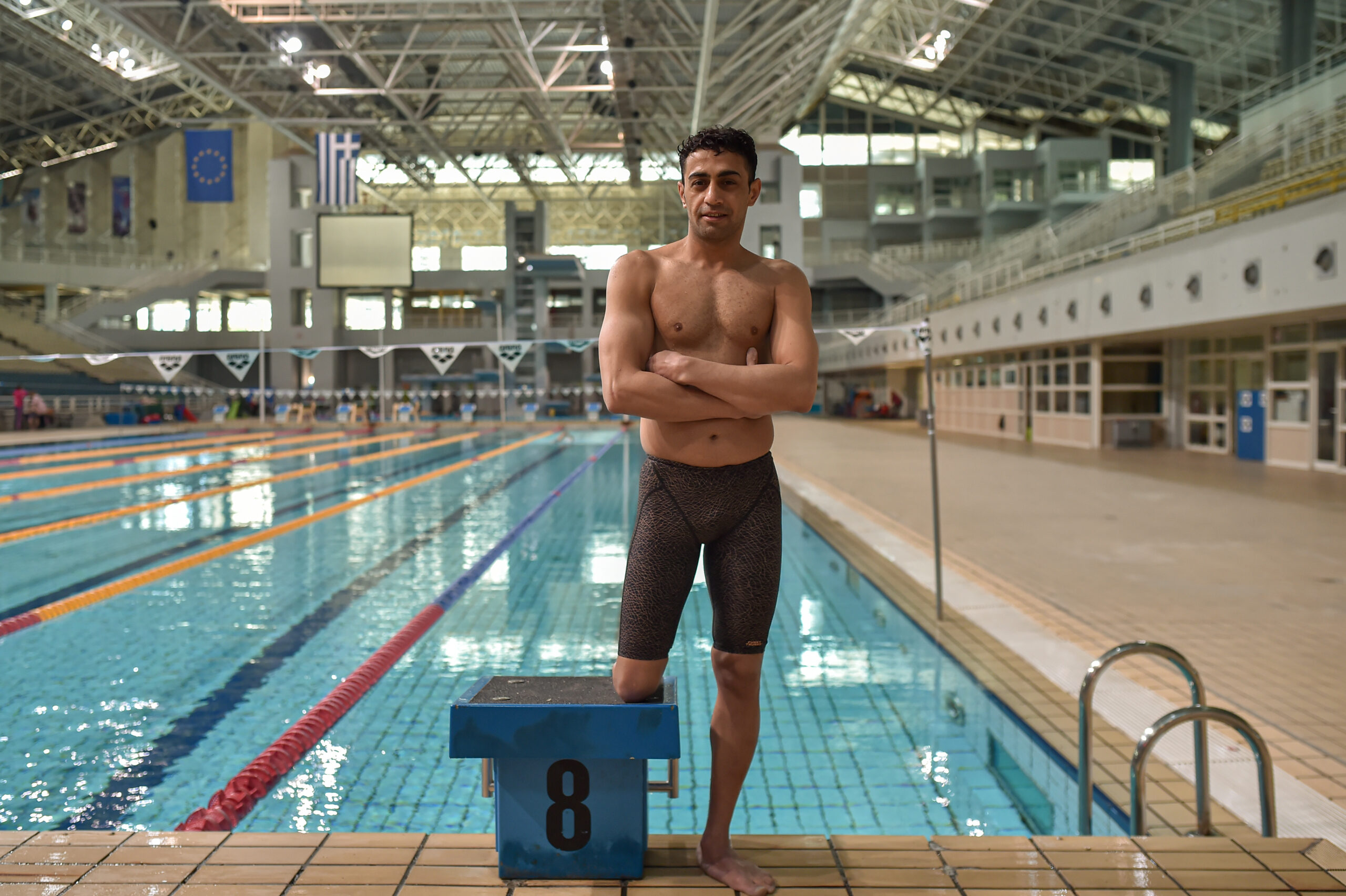 Le réfugié syrien Ibrahim Al Hussein pendant son entraînement de natation en Grèce. © Getty Images / Milos Bicanski