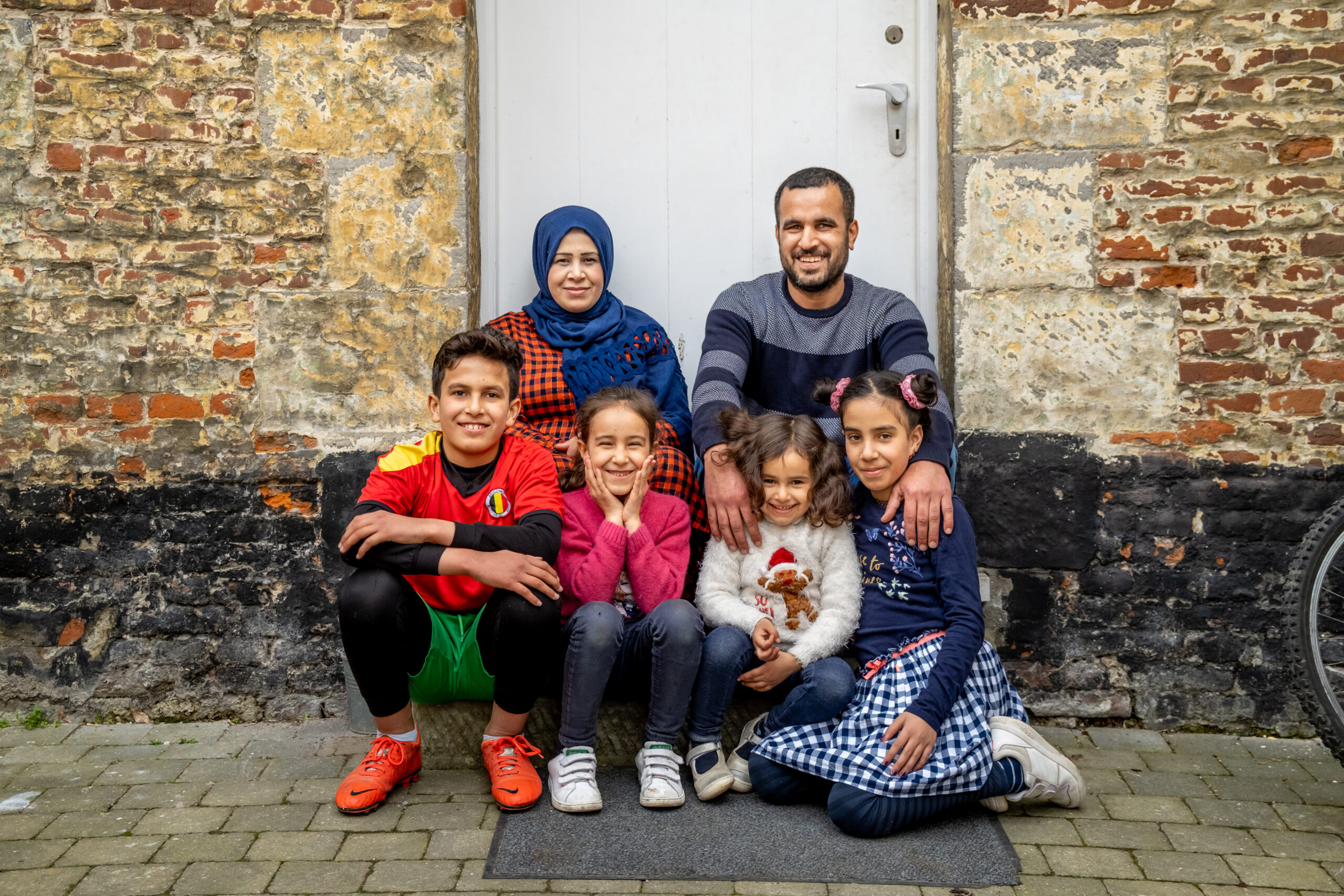 Khadija en Mohammad en hun kinderen zijn de oorlog in Syrië ontvlucht en werden hervestigd in België. © Caritas/Isabel Corthier