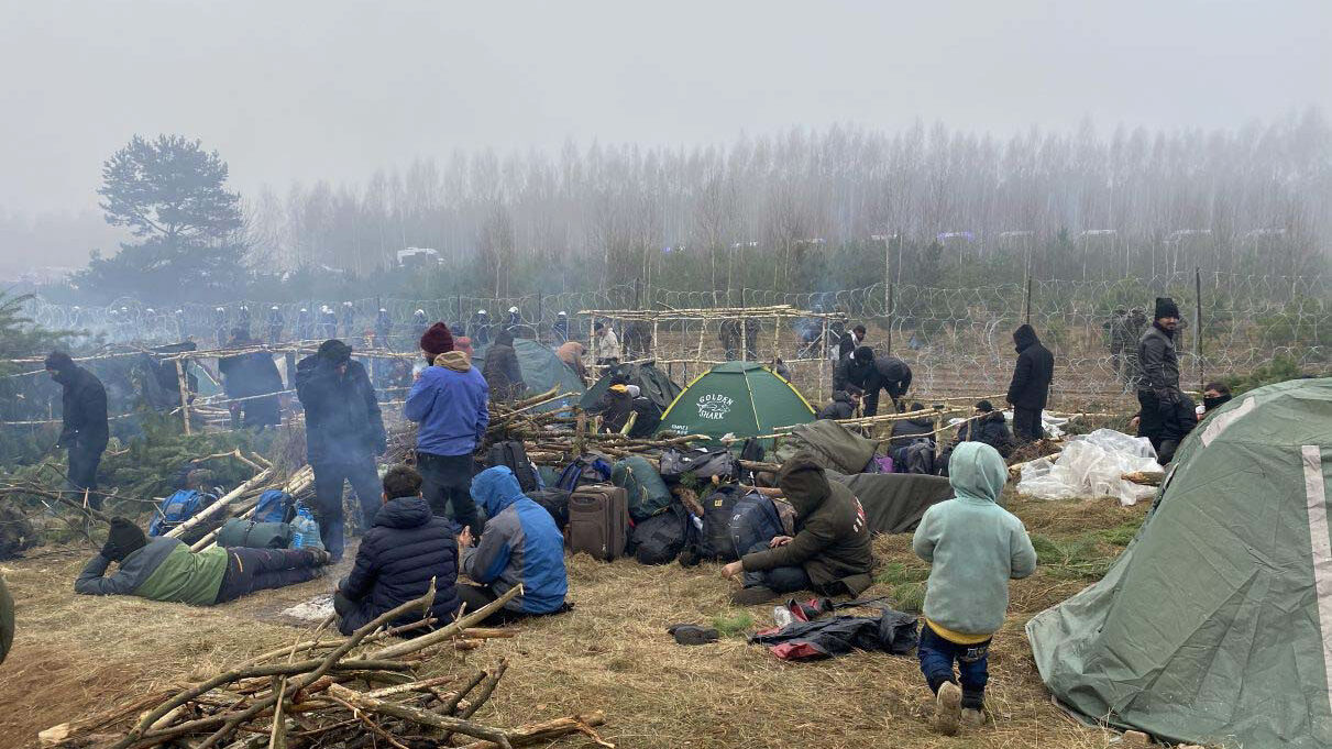 Vluchtelingen en migranten gestrand aan de grens van Wit-Rusland. © UNHCR/Katsiaryna Golubeva