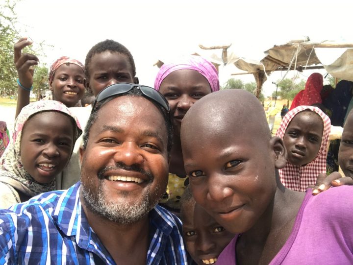 A lighter moment with children who watched the equipment being installed in Sayam Forage Camp. Photo: UNHCR © UNHCR/ Fardy Mandy