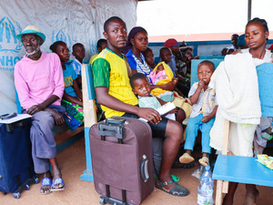 Returning refugee families wait at a transit centre in the Central African capital Bangui