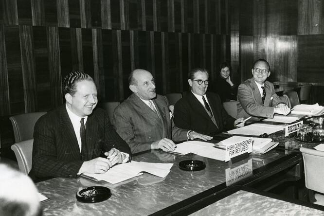 Black and white photo of a conference