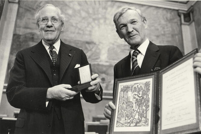 UN High Commissioner for Refugees, Mr. Poul Hartling, receiving the 1981 Nobel Peace Prize from Professor J. Sanness, Chairman of the Nobel Committee.