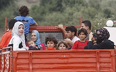 Ο αριθμός των Σύριων προσφύγων αυξήθηκε δραματικά τον Αύγουστο, με περισσότερους από 100.000 να μεταβαίνουν σε γειτονικές χώρες