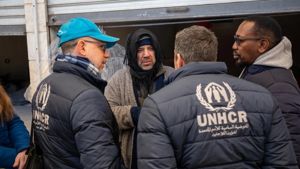 Mazen father of four from Aleppo meets UNHCR staff outside the retail unit in Al-Harir souq where his family are staying_UNHCR_Hameed Maarouf