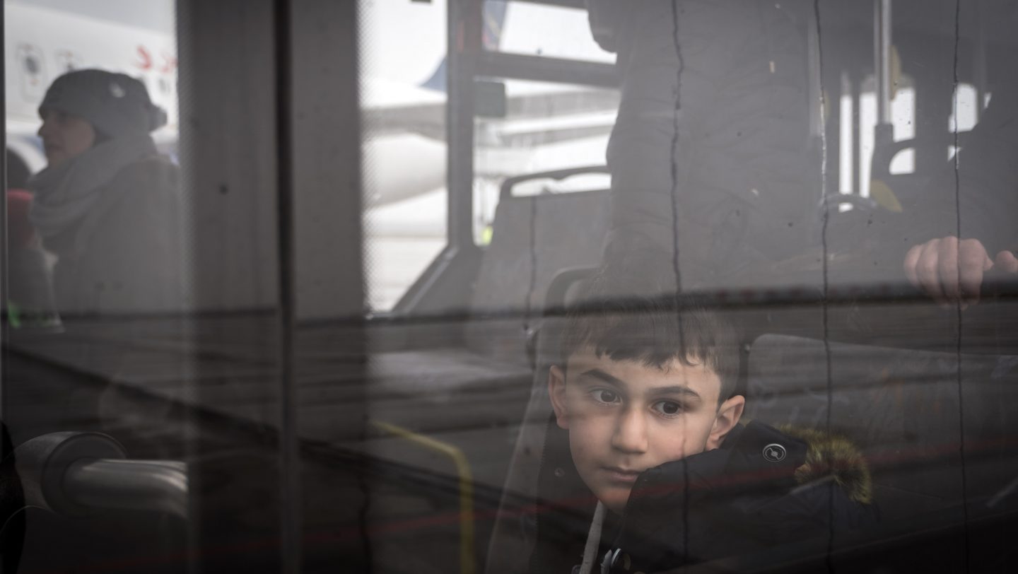 Germany. Syrian and non-Syrian resettlement refugees arrive via air charter at Hanover Airport.