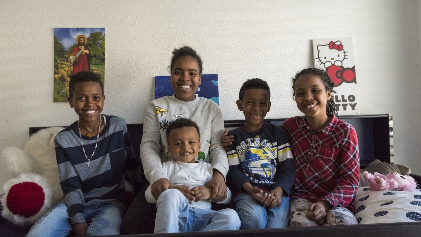 Switzerland. Family finally reunited and safe together, after two children were lost in the desert