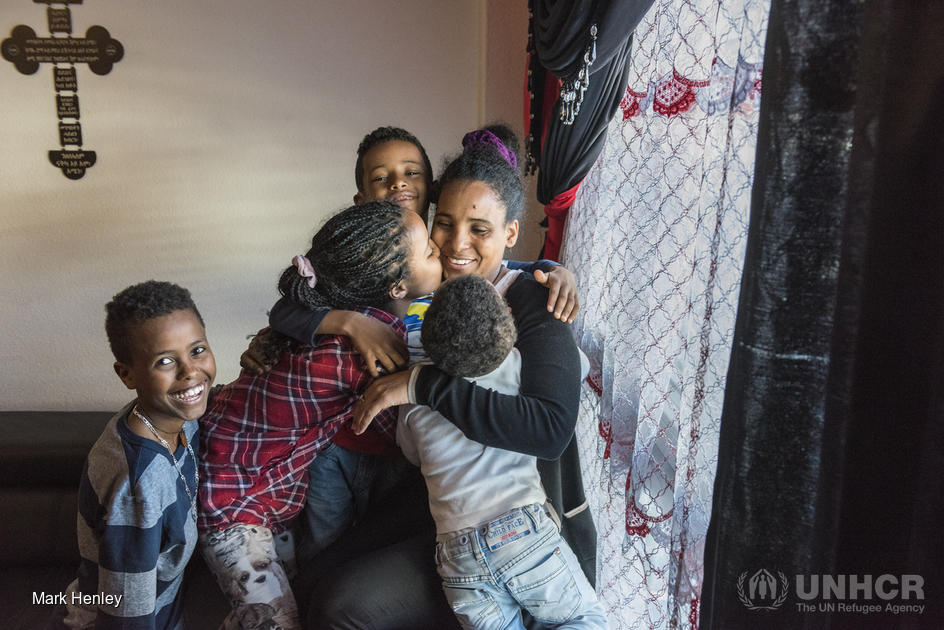 Winta a vu sa famille à nouveau réunie grâce à la participation de la Suisse au programme de réinstallation. © UNHCR/Marc Henley