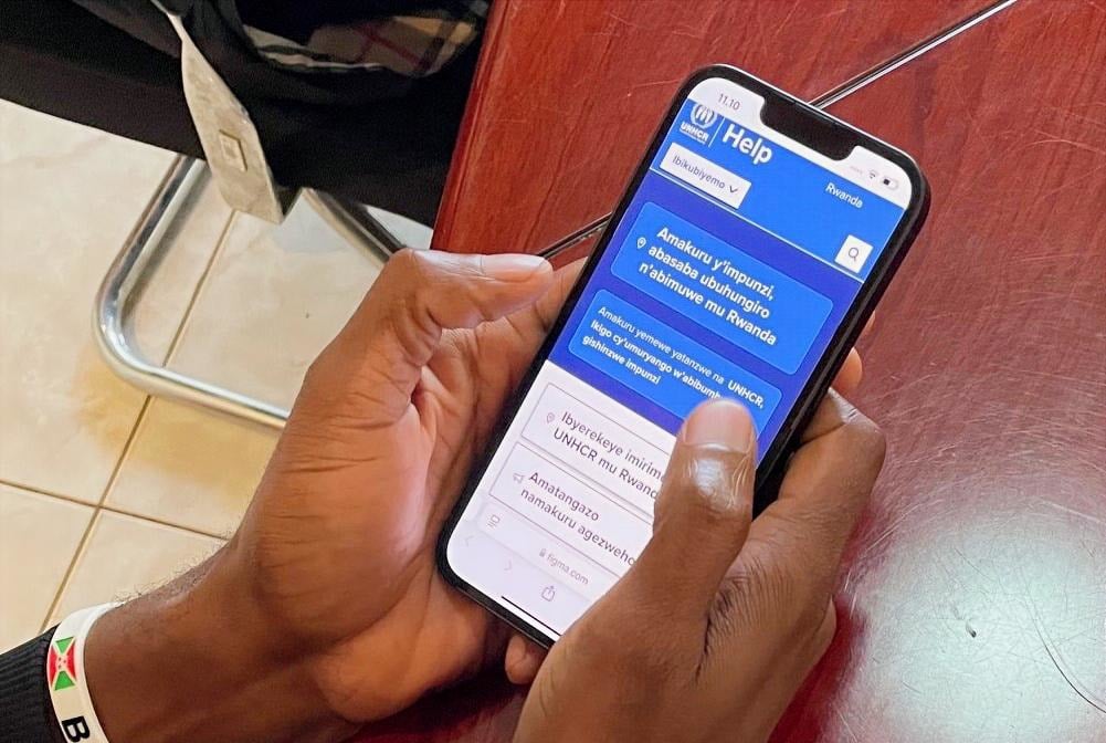 Phone showing the Rwanda Help site