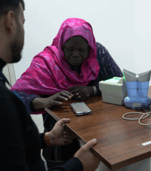 Sudanese refugee creating her My Services account