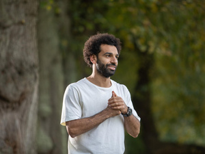 Egypt. Liverpool striker Mo Salah pays a virtual visit to refugees and local children studying in a classroom
