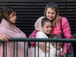 Refugees from Ukraine wait to be registered at UNHCR's cash enrolment centre