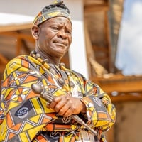 A man in a colorful outfit.