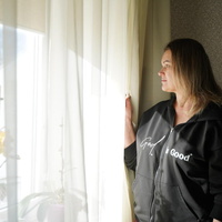 A woman looking out of a window