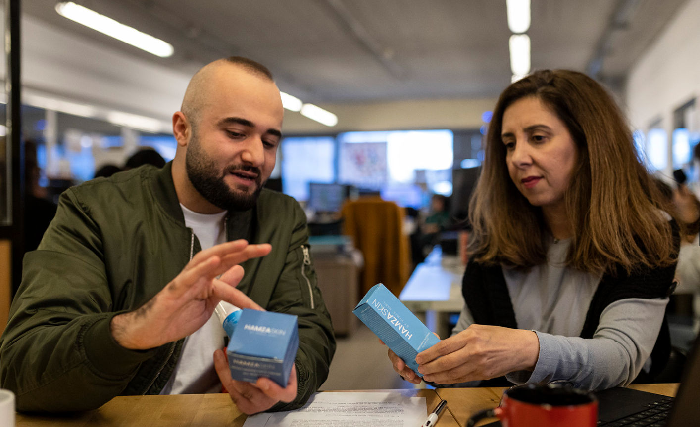 Hamza receives guidance from Maria Theodoropoulou, Entrepreneurship Officer with METAdrasi, at UNHCR's "Ready4Business"entrepreneurship programme.