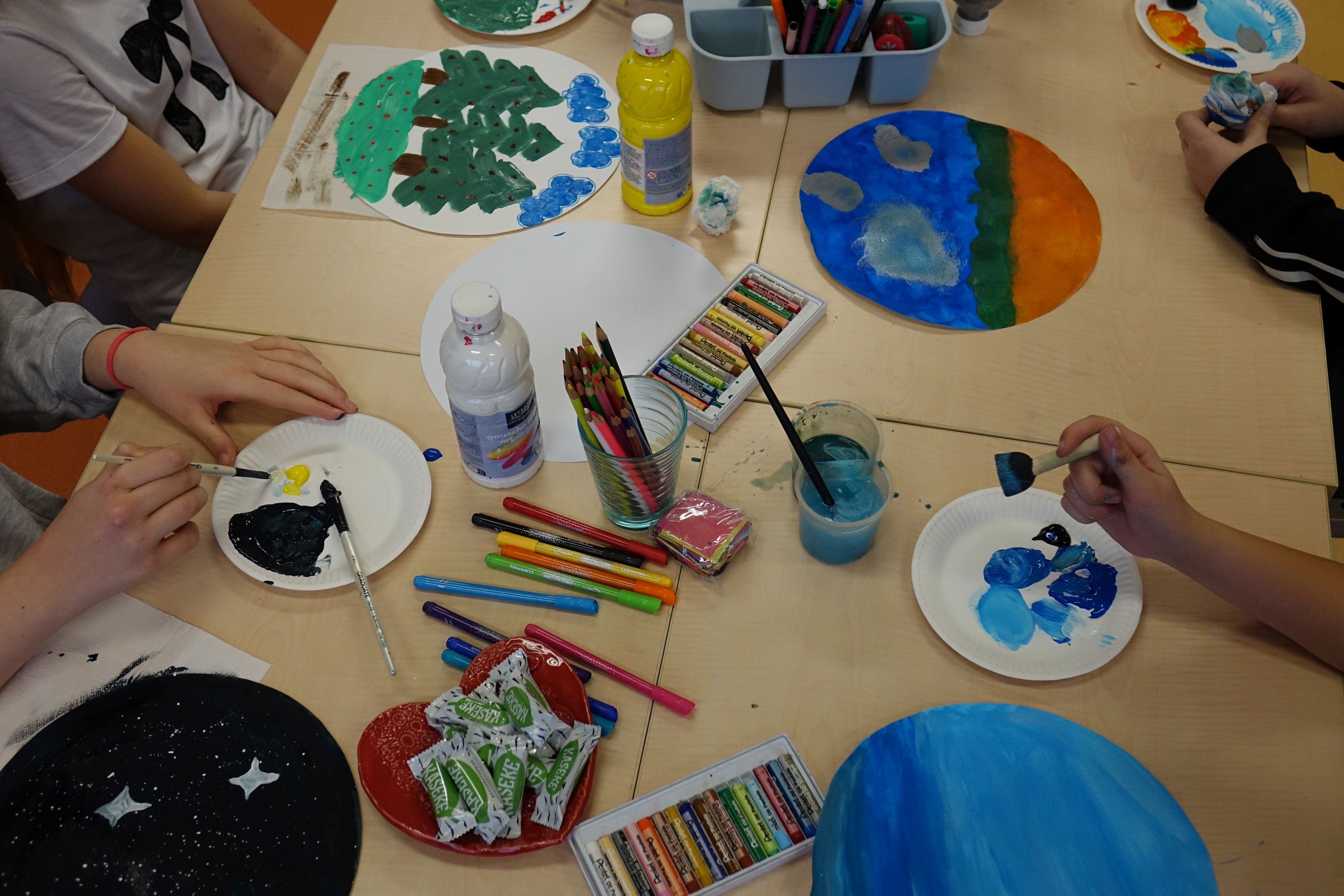 A table full of art supplies