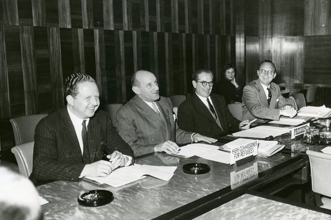 Black and white photo of a conference