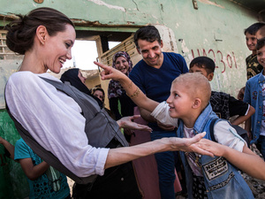 UNHCR Special Envoy Angelina Jolie in Mosul with an eight-year-old girl in West Mosul, Iraq