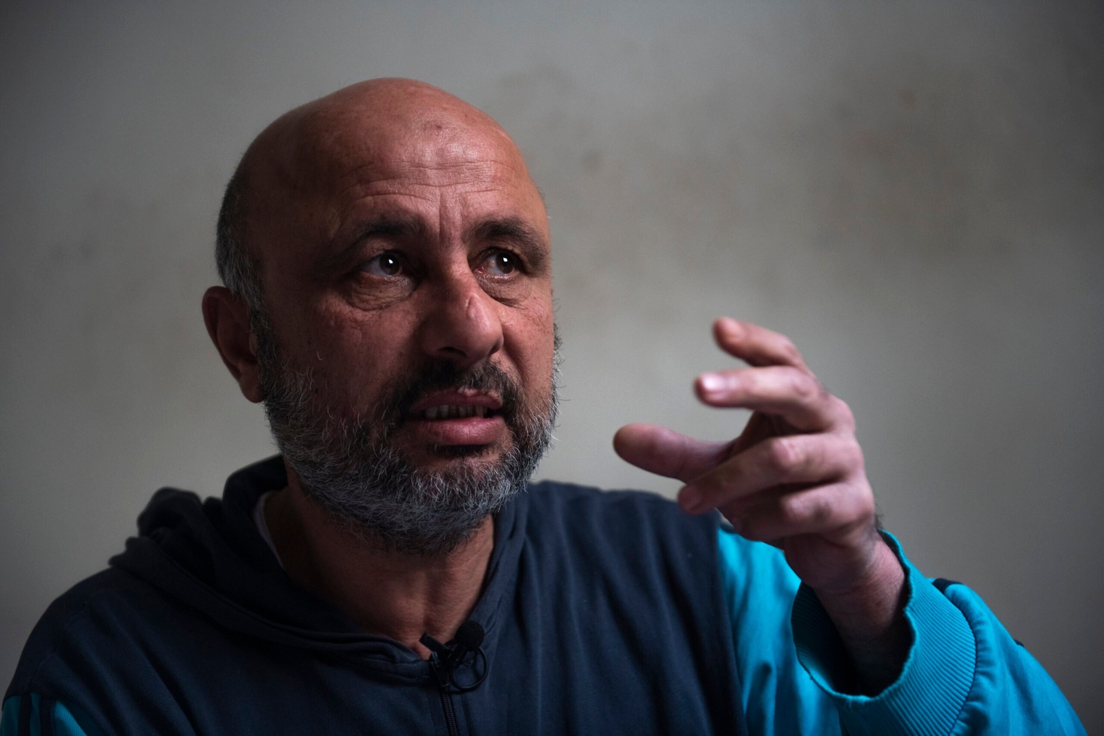 Hala’s husband Yasser explains how the family’s situation has deteriorated over the course of the 10-year criris. © UNHCR/Haidar Darwish