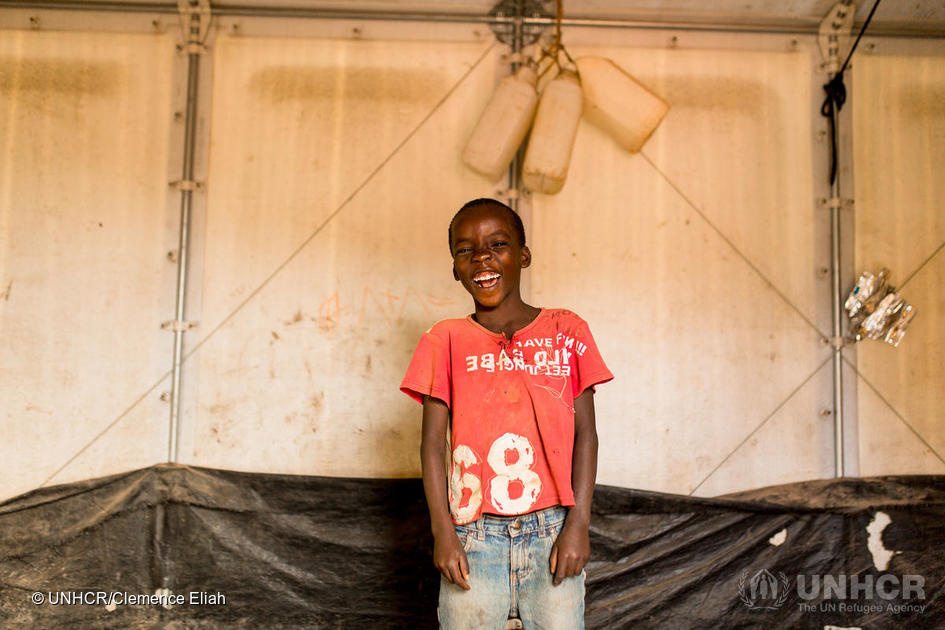 A child laughs at Kigoma refugee camp in Tanzania. © UNHCR/Clemence Eliah