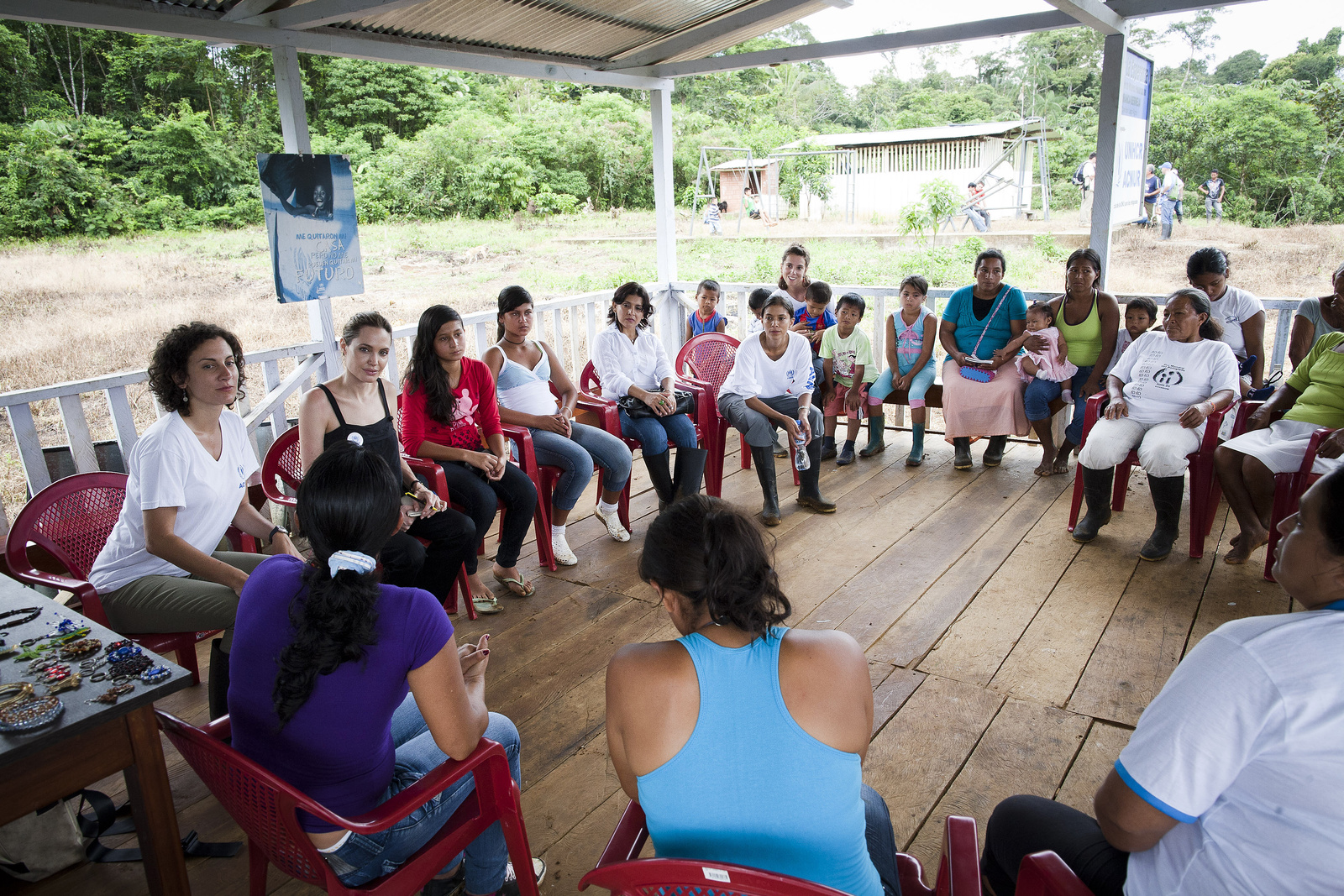Angelina Jolie (third from left) meets members of the Women's Foundation of Providencia community.