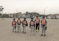 Baseball club brings a bit of home to Venezuelan refugee and migrant kids in Peru
