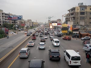 Three lanes of traffic head south out of Sidon, Lebanon.