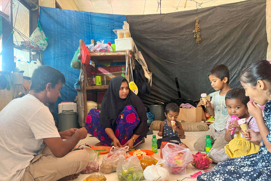 Family sitting at the communal kitchen