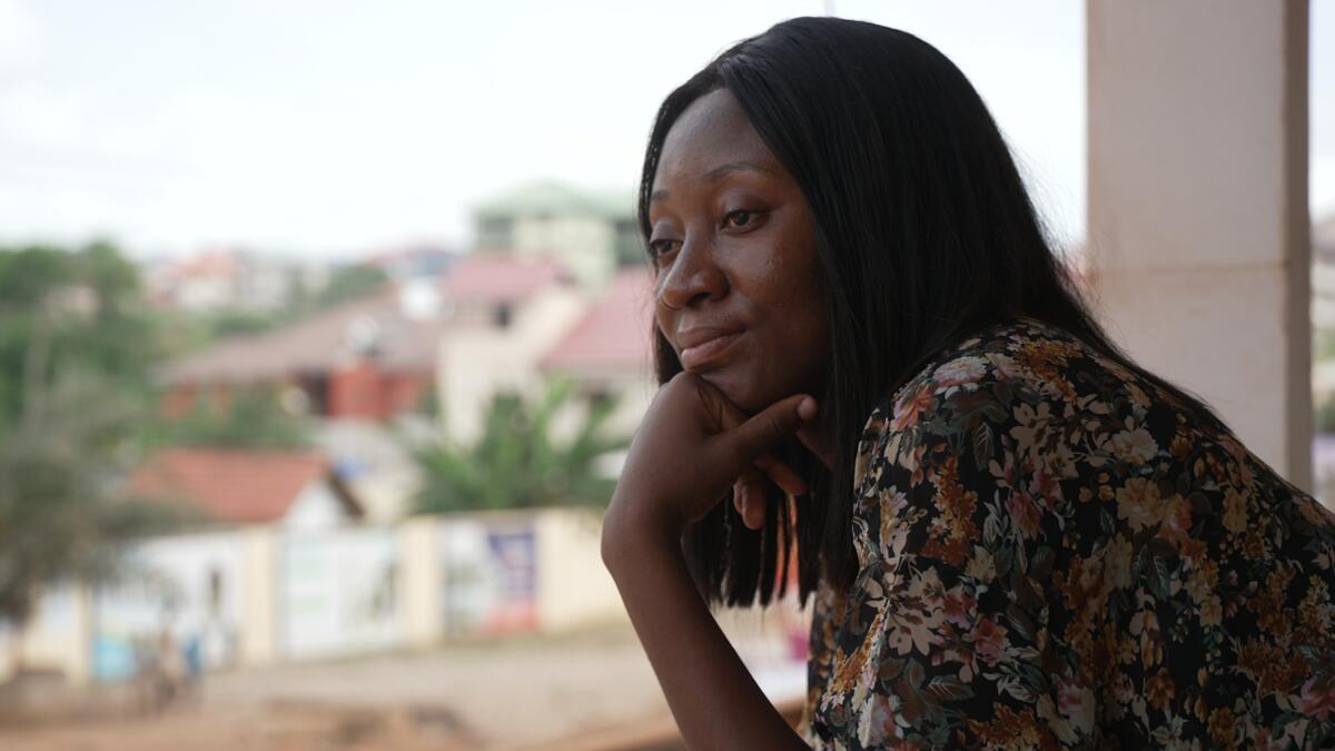 Ghana. Louange Koffi, a refugee nurse at a clinic she volunteers in Accra