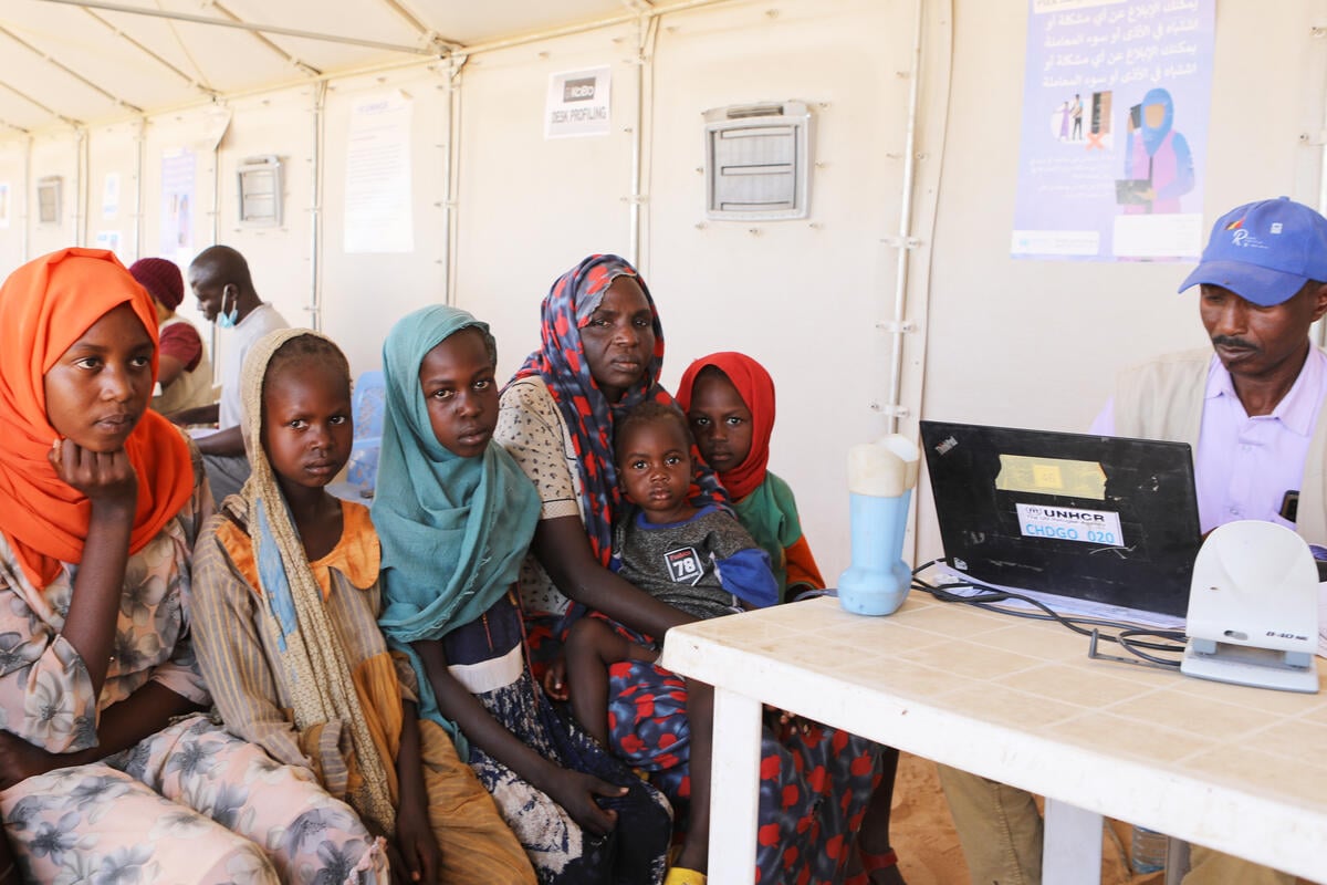A family of Sudanese refugees has their details processed