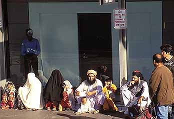 A newly arrived Afghan family at JFK airport, New York.