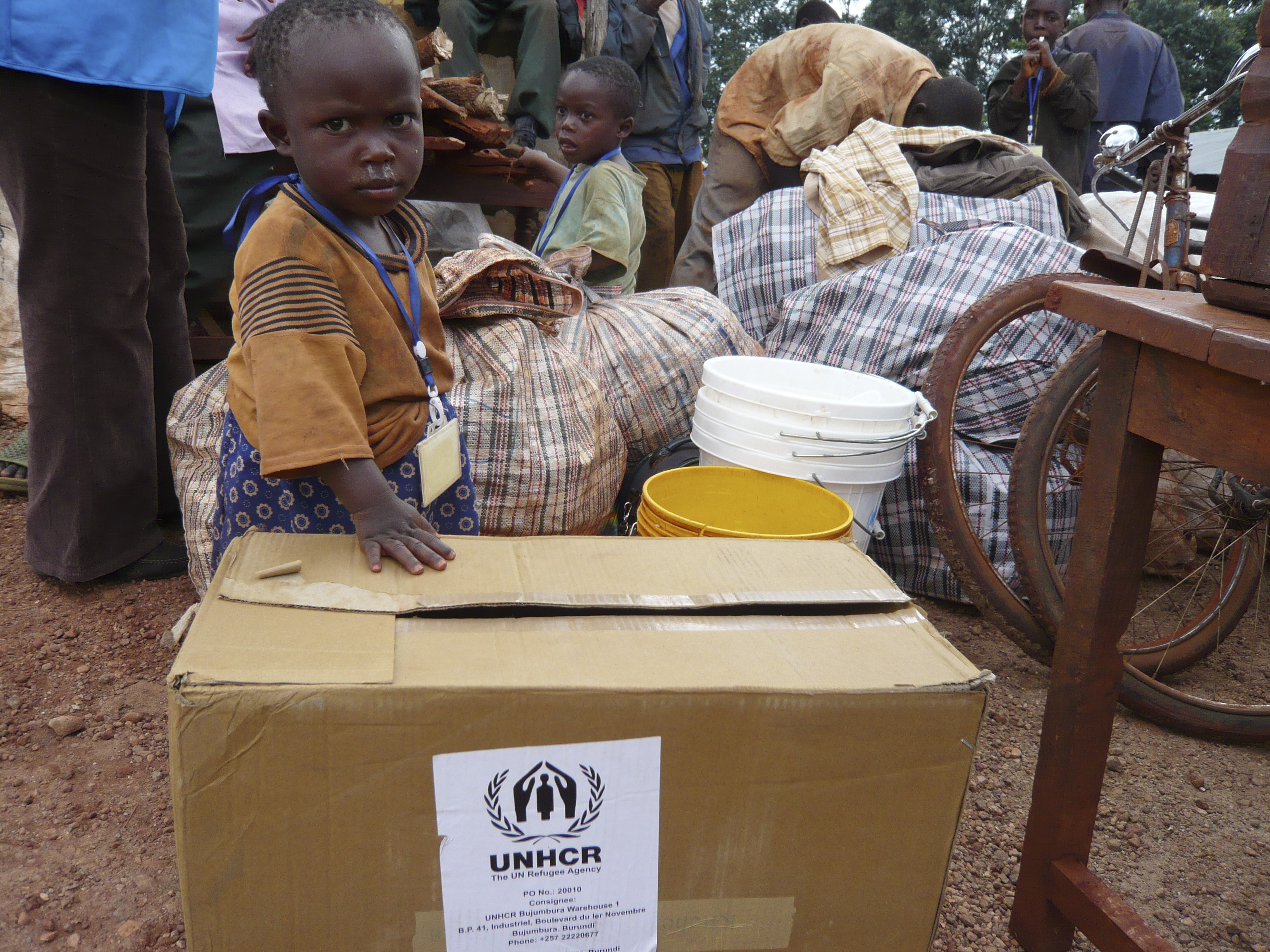 A baby, born a refugee in Tanzania, on her first morning in her homeland of Burundi after returning in a UNHCR-organized convoy.